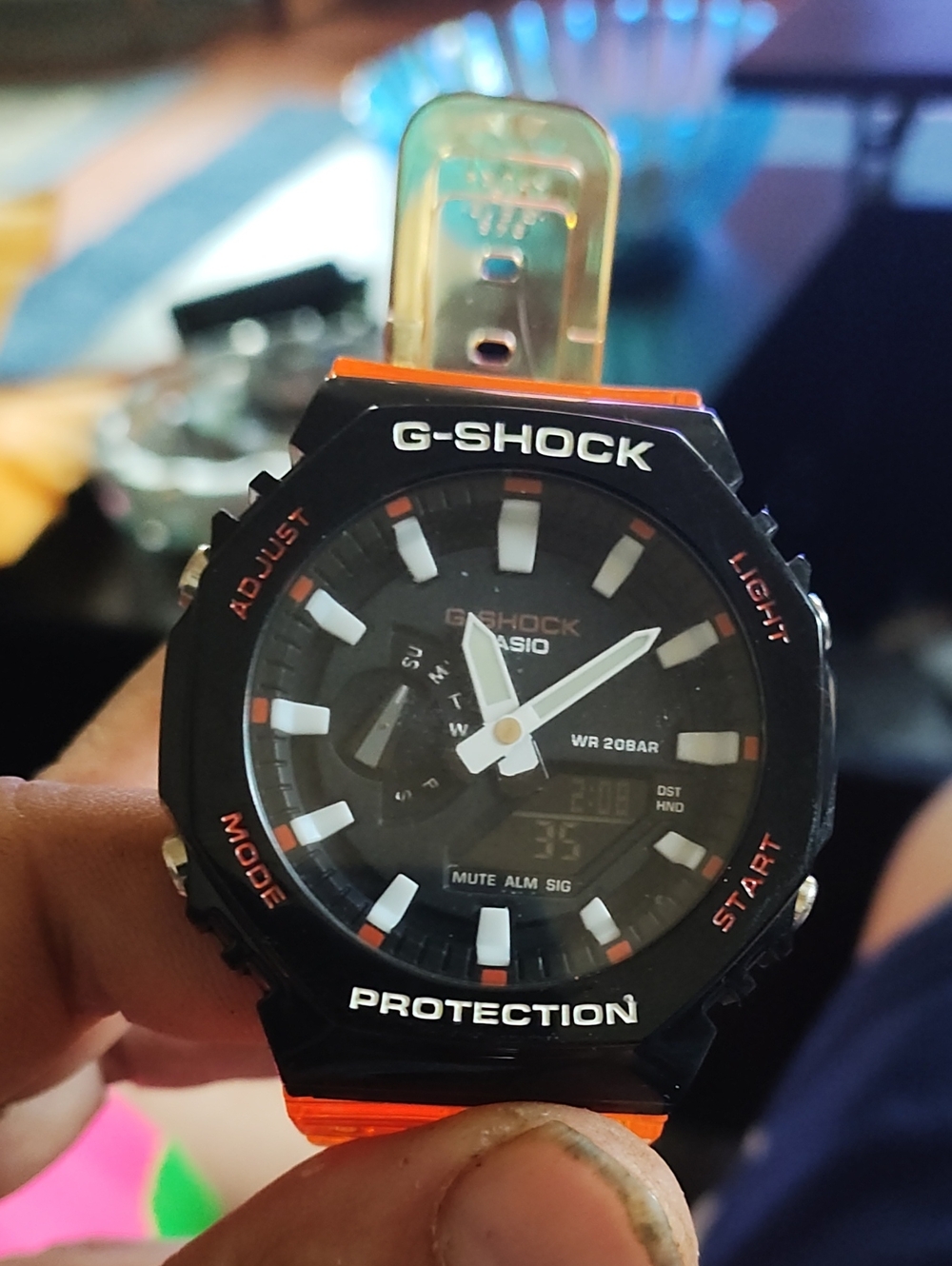 G-Shock Black Watch with Orange Accents and Orange Strap